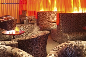 Restaurant interior (oriental style) - soft sofas and armchairs