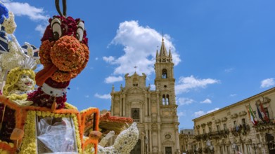 The puppet smiling flower in a Sicilian square