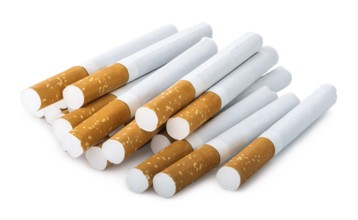 Pile of filtered cigarettes isolated on a white background