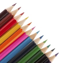 Row with color pencils on white background