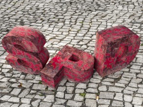 SPD crisis. Rusted party logo on pavement