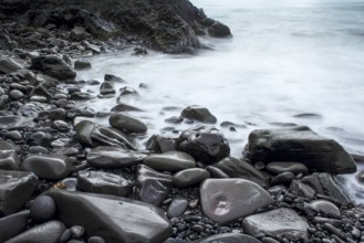 Time exposure of stony beach at Hellnar, Snaefellsnes National Park, Iceland
