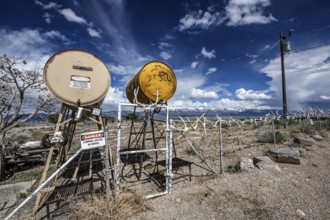 Truck stop with oil barrels and a fence of deer antlers, Highway 50, Loneliest Road in America,