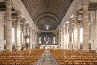 Neoclassical church interior of the Eglise Saint-Louis with monumental columned peristyle of