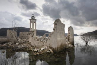 Ruins of an abandoned and deserted church in the water of a dam. Agios Nikolaos Alassa dam Cyprus