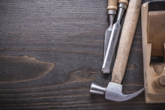 Copy space image of joiner's tools on vintage wooden board construction concept