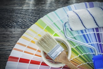 Paint brushes roller color pantone fan household tape on wood board