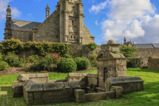 Enclosed parish Gothic church Eglise Saint-Gouesnou and spring of the same name, Gouesnou near