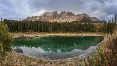 Karersee is located in the Latemarwald forest in the upper part of the Eggental valley, of the city