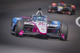 TOM BLOMQVIST (R) (66) of Cambridge, England practices for the 108th Running of the Indianapolis