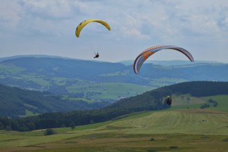 Hang glider at the Wasserkuppe, Rhön Biosphere Reserve, Heß