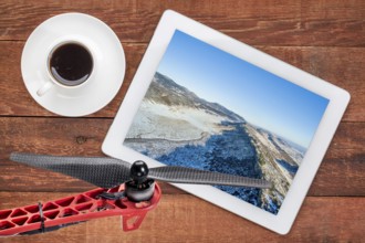 Aerial landscape photography concept - reviewing aerial pictures of a mountain valley in Colorado