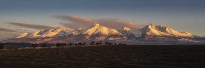 Panorama of the foothills of the High Tatras at sunrise, Slavskovsky and Lomnicky peaks