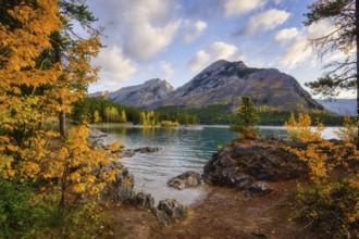 Beautiful autumn landscape scene in lake and mountain in background in west Canada