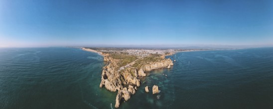 Panorama shot, drone shot, Ponta da Piedade, typical Algarve rock formation, Portugal