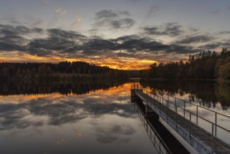 Sunset over a lake Atmospheric landscape shot from the Harz Mountains