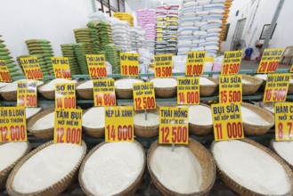 Different sorts of rice in baskets with prices, Vietnam