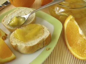 Orange marmalade on baguette