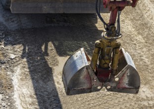 Excavator grab on the construction site