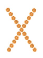 Letter X from orange slices isolated on white background