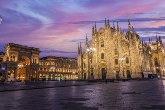 Purple sunrise sky over Duomo cathedral in Milan, Italy