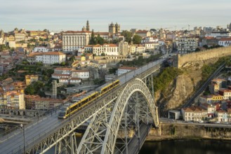 Porto City, Douro River and Dom Luis Bridge I with Tram in Morning. View from Tourist Viewpoint
