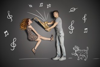Happy valentines love story concept of a romantic couple against chalk drawings background. Woman