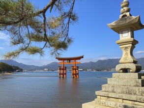 Stone lamp at the seaside close to Floating Torii gate, Hatsukaichi, Hiroshima, Japan