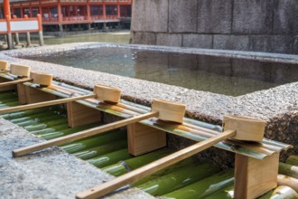Chozuya with bamboo spoons for ritual purification in the temple