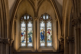 Wells, United Kingdom, 1 September, 2022: close-up view of a stained glass window inside the