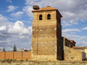 Stork nest on the bell tower of the Church of San Bartolome, Calzadilla de los Hermanillos, Castile