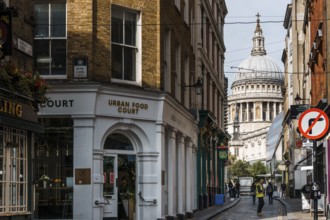 London, UK, August 25, 2023: View of Saint Paul Cathedral from Watling Street with people walking