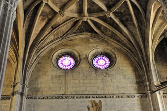 Gothic interior with impressive vaults and colourful rose windows, Iglesia de Santa Maria de la