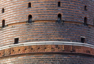 Field side with terracotta decoration