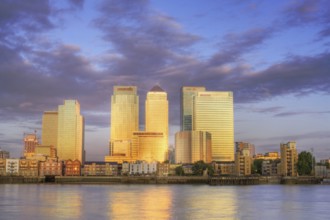 Canary Wharf District at sunrise. Canary Wharf is a commercial estate on the Northern side of the