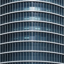 Abstract steel and glass background of high rise building skyscraper facade. Commercial modern