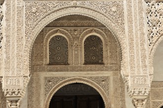 Alhambra, Granada, Andalusia, Spain, Fine arabesques and intricate architectural details in stone