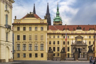 View of enter in Prague castle with St. Vitus Cathedral tower, Czech republic
