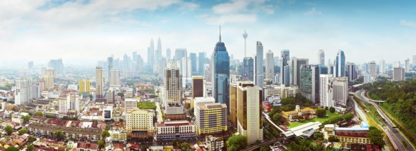 Panorama cityscape view in the middle of Kuala Lumpur city center, early morning with little mist,