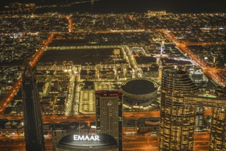 Dubai night view seen from the observation deck of Burj Khalifa. Shooting Location: Dubai