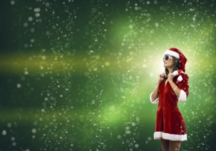 Young brunette woman in santa clothes on colorful background