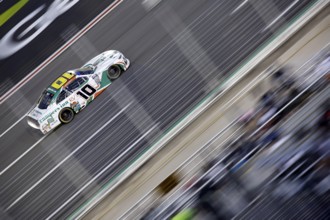 NASCAR Xfinty Driver, Justin Haley (10) races off turn four during the Alsco Uniforms 250 at the