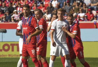 Football match, from left to right Marvin PIERINGER 1.FC Heidenheim, Lennard MALONEY 1.FC
