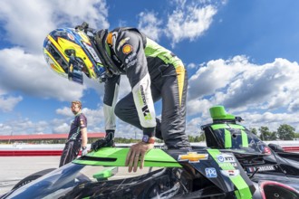 ROMAIN GROSJEAN (77) of Geneva, Switzerland prepares to practice for the Honda Indy 200 at Mid-Ohio