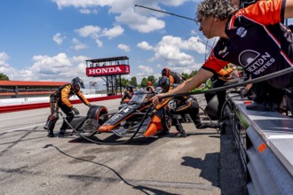 SANTINO FERRUCCI (14) of Woodbury, Connecticut comes down pit road for service during the Honda