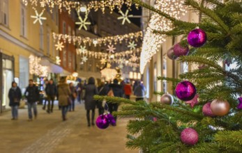 Beautiful Christmas decorations on Herrengasse street, at night, in the city center of Graz, Styria