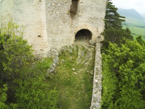 High angle view to a castle ruin in the wood