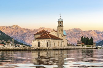 Dawn over Our Lady of the Rock island in Perast, Montenegro