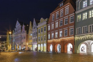 Historical houses on Altstadt street in Landshut in evening, Germany