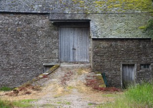Exterior of the entrance of a beautiful traditional british farmhouse